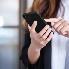 Soft-touch matte finish on the black TPU iPhone 14 case with anti-slip grip