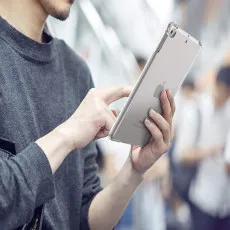 iPad Pro 12.9 (2015) in clear case with non-slip grip for secure handling.