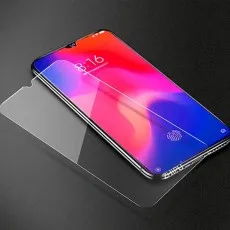 Tempered glass screen protector placed on a smartphone with an in-display fingerprint scanner