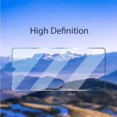 A transparent screen protector placed over a mountain landscape, emphasizing its high-definition clarity.
