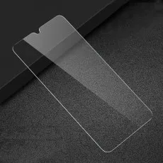 Tempered glass screen protector for Tecno Spark 8T with notch cutout, placed on a dark surface