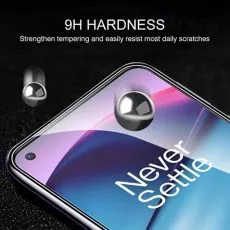 OnePlus 9 Pro screen protector with 9H hardness resisting scratches from falling metal balls. Never Settle displayed.