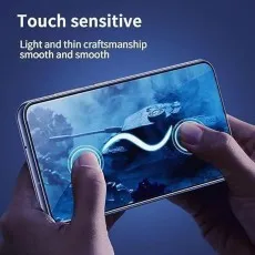 Touch-sensitive screen protector shown on a phone with fingers interacting with a game, highlighting smooth and responsive touch.