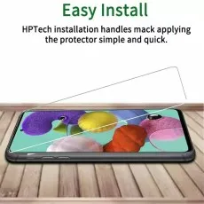 HPTech easy-install screen protector being applied to a Galaxy A71 5G UW (inferred) on a wooden surface