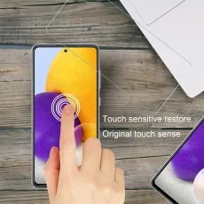 A finger touching the screen of a Samsung Galaxy phone with a screen protector