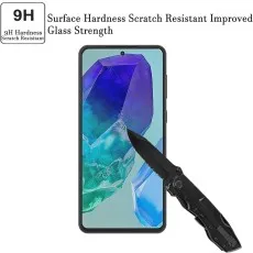 9H scratch-resistant screen protector being tested with a knife on a Samsung Galaxy F55