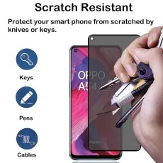 Oppo A54 5G scratch-resistant screen protector being tested with keys and a craft knife.