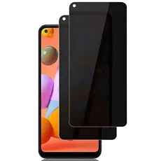 Galaxy M11 with a privacy screen protector partially applied and a spare one beside it.