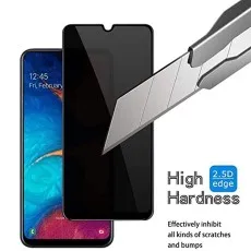 Smartphone with a screen protector being tested with a knife, highlighting its high hardness and scratch resistance
