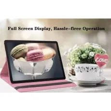 Pink 360° rotating leather case for Samsung Galaxy Tab A9 Plus 11-inch, used as a stand with tablet displaying macarons, next to a cup and flowers