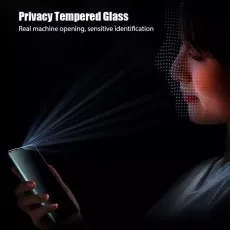 protector allowing sensitive face identification. Woman unlocking phone with face recognition