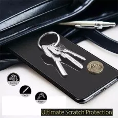 Ultimate scratch protection Keys and coin on phone screen
