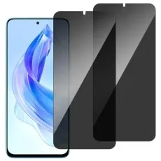 Honor 90 with privacy screen protector partially applied, two spare protectors beside it.