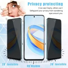 Honor GT with privacy screen partially applied, two spares beside it.