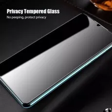 Privacy tempered glass screen protector on a phone, angled view showing the dark screen. No peeping, protect privacy.