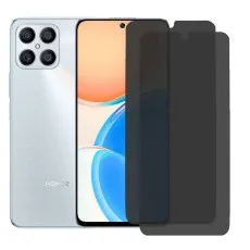 Silver Honor X8 with privacy screen partially applied, two spares beside it.