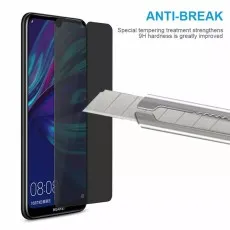 Huawei Enjoy 20 with anti-break privacy screen being scratched by a utility knife