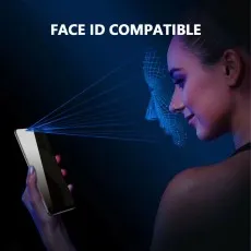 A person uses a smartphone featuring FACE ID COMPATIBLE with a facial scan graphic