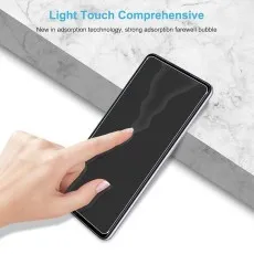 A hand touches a phone screen, showing Light Touch Comprehensive technology with strong, bubble-free adhesion