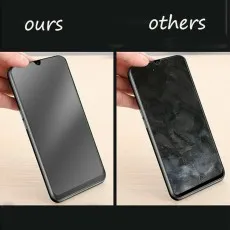 Two smartphones, one with a clear matte screen protector (ours) and another with a smudged one (others)