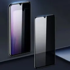 Two phone screen protectors, one reflective and one darkened, on a dark background