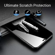 A smartphone with keys, a pen, and cables on its screen, illustrating Ultimate Scratch Protection