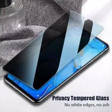A privacy tempered glass screen protector is shown floating above a phone