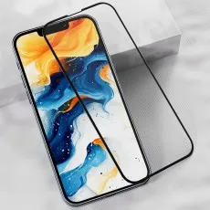 A smartphone with a vibrant abstract wallpaper and a clear screen protector beside it