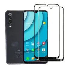 Xiaomi Mi 9 SE phone next to two 9D tempered glass screen protectors.