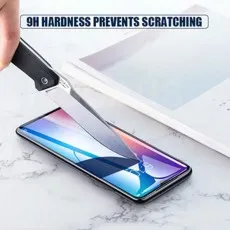 A knife attempting to scratch a smartphone screen, indicating 9H HARDNESS PREVENTS SCRATCHING