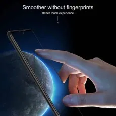 A hand touching a phone screen with a smoother without fingerprints display