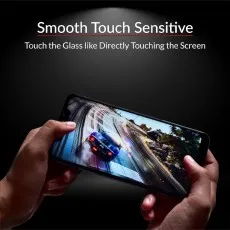 A person plays a racing game on a smartphone, highlighting the screen protector's smooth touch