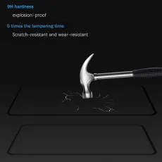 A phone screen protector with 9H hardness, being hit by a hammer, showing cracks