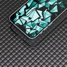 Tempered glass screen protector for Motorola Edge 2022 on textured black surface