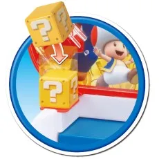 The coin pusher toy's mechanism, showing a plastic Toad character near a gold coin and a red coin.