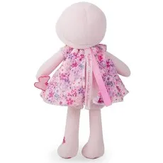 A back view of the Kaloo soft doll, showing the floral pattern on her dress and the brand tag.