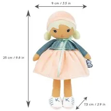 The soft doll with blonde pigtails and a pink hat, a blue cardigan, and a peach dress. The image highlights its measurements 25 cm tall and 9 cm wide.