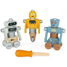Three colorful wooden robots from the Janod toy set—one yellow, one light gray, and one light blue—standing next to a wooden screwdriver.