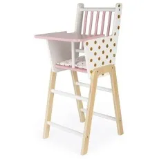 A detailed view of a Janod doll's high chair, featuring a pink tray and a white seat with gold polka dots.