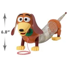 The classic Slinky Dog toy with its height of 6.8 inches shown by an arrow..