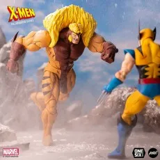 A Mondo X-Men The Animated Series Sabretooth figure fighting a Wolverine figure in a snowy scene.