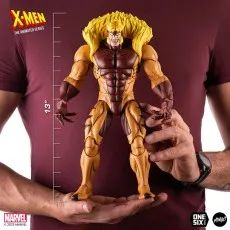 A pair of hands holds a Mondo X-Men Sabretooth figure, showing its 13-inch