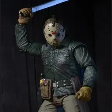 A detailed Jason Voorhees collectible figure from Friday the 13th holding a weapon.