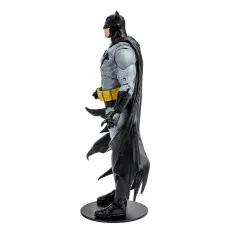 Side view of a classic gray-suit Batman action figure on a black display stand.