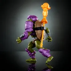 Side profile of a TMNT Donatello figure in purple armor, with his staff attached to his shell.