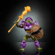 TMNT Donatello figure in purple armor, holding a staff and a turtle shell shield.