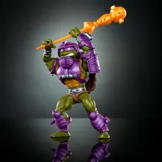 TMNT Donatello figure in purple armor, swinging a golden staff over his head.