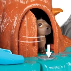A detailed shot of the toy capybara from the Antonio's treehouse playset, inside its hiding place.