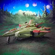 The Transformers Skyquake toy in its jet mode, resting on a dirt-like surface with a cosmic background.