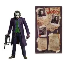 A Joker action figure from The Dark Knight next to a collage of the figure, notes, and photos
